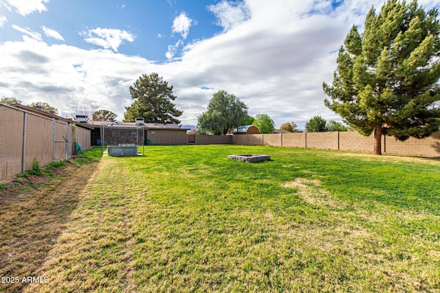 view of yard featuring a fenced backyard