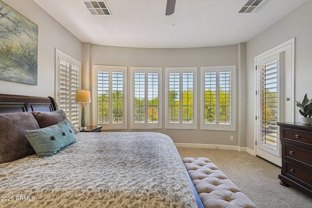 carpeted bedroom with visible vents, baseboards, access to outside, and a ceiling fan