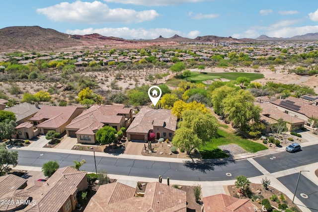 aerial view featuring a mountain view and a residential view