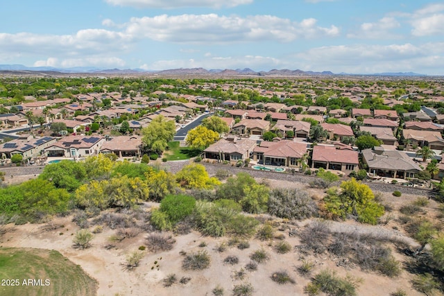 drone / aerial view with a mountain view and a residential view