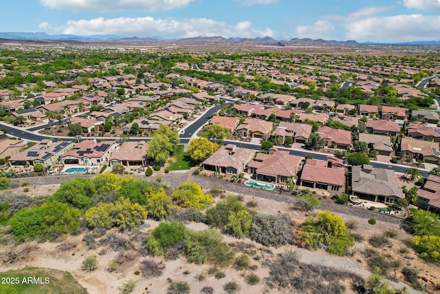 aerial view featuring a mountain view and a residential view