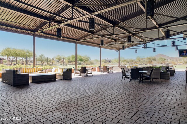 view of patio with a gazebo and an outdoor hangout area