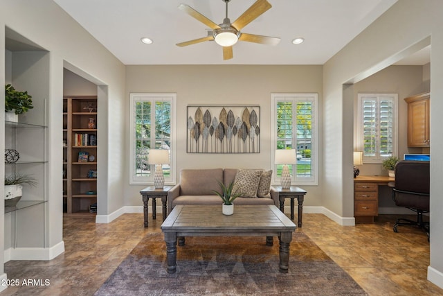 sitting room featuring ceiling fan, baseboards, and recessed lighting