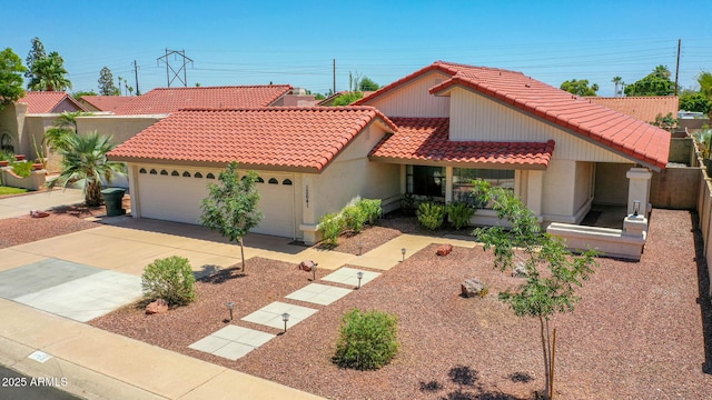 12641 S 39th Pl, Phoenix, AZ 85044 - view of front of house with a tile roof, an attached garage, stucco siding, and driveway