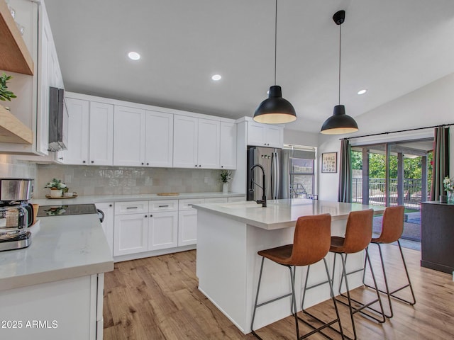 12641 S 39th Pl, Phoenix, AZ 85044 - kitchen featuring tasteful backsplash, freestanding refrigerator, white cabinets, light wood-style flooring, and recessed lighting