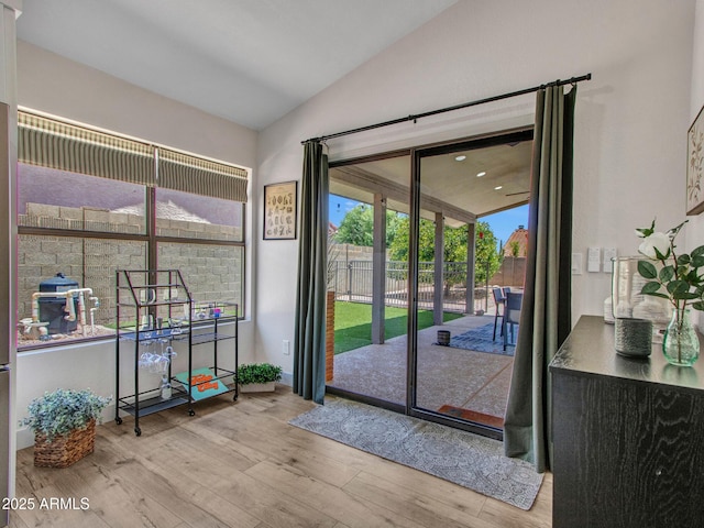 12641 S 39th Pl, Phoenix, AZ 85044 - doorway with lofted ceiling and wood finished floors