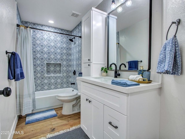 12641 S 39th Pl, Phoenix, AZ 85044 - full bathroom featuring vanity, shower / bathtub combination with curtain, and wood finished floors