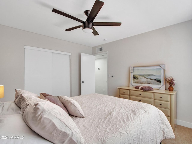 12641 S 39th Pl, Phoenix, AZ 85044 - bedroom featuring a closet, light carpet, and a ceiling fan