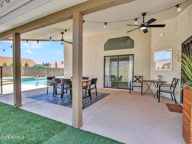 12641 S 39th Pl, Phoenix, AZ 85044 - fenced backyard with a ceiling fan, a patio area, and outdoor dining area