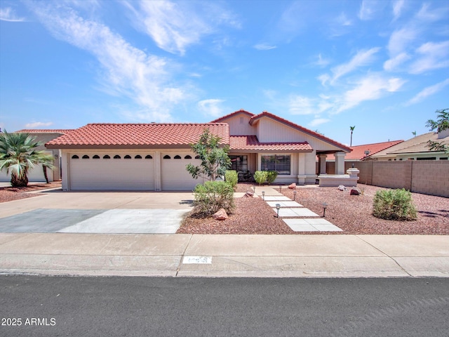 12641 S 39th Pl, Phoenix, AZ 85044 - view of front of property featuring a tiled roof, an attached garage, driveway, and stucco siding