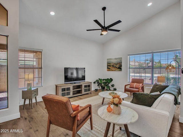 12641 S 39th Pl, Phoenix, AZ 85044 - living room with plenty of natural light, wood finished floors, a ceiling fan, recessed lighting, and high vaulted ceiling