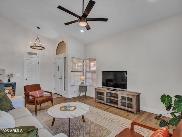 12641 S 39th Pl, Phoenix, AZ 85044 - living room featuring ceiling fan, wood finished floors, a chandelier, recessed lighting, and high vaulted ceiling