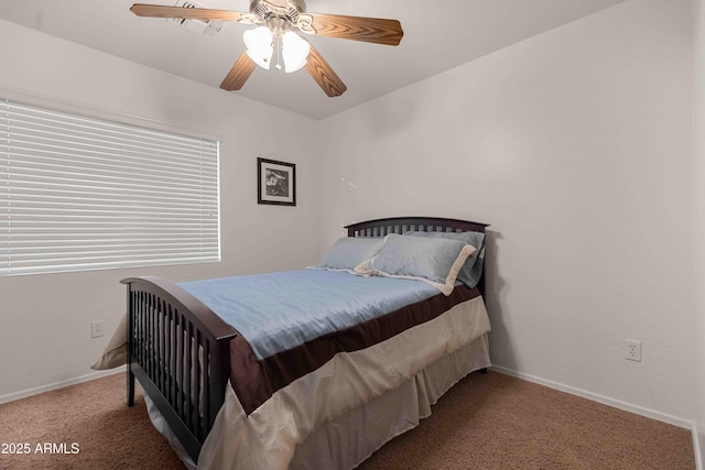 bedroom with baseboards, carpet floors, and ceiling fan