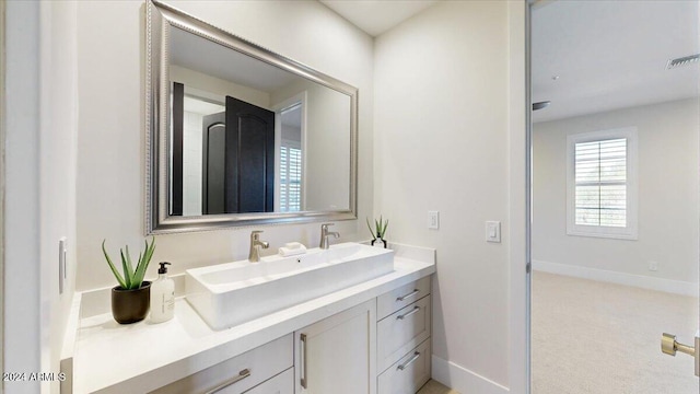 bathroom featuring vanity