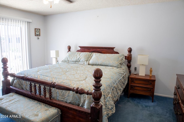 carpeted bedroom with a textured ceiling