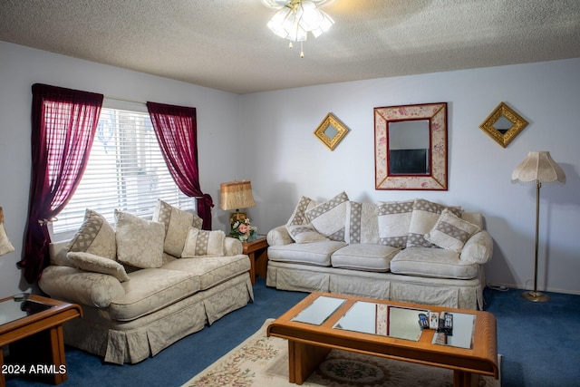 living room with carpet and a textured ceiling