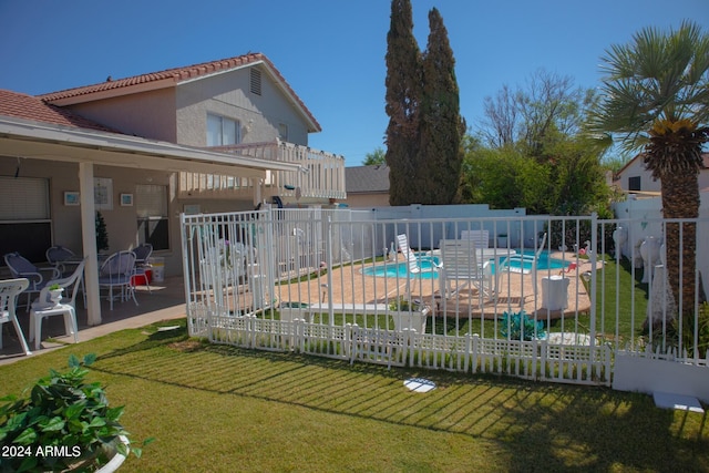 view of swimming pool featuring a patio area