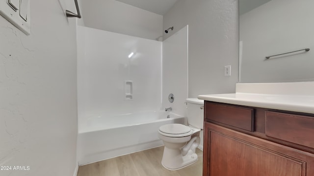 full bathroom featuring shower / tub combination, wood-type flooring, vanity, and toilet