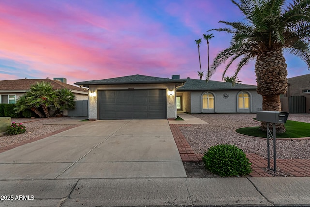 view of front of home with a garage