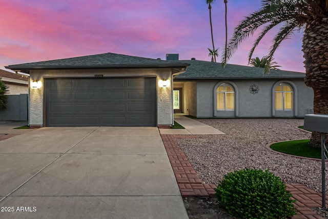 view of front of property featuring a garage