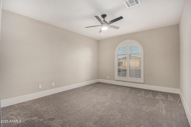 unfurnished room with carpet flooring and ceiling fan