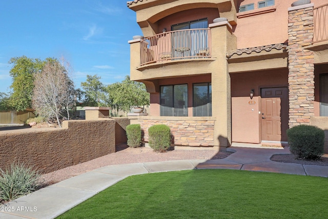 property entrance with a balcony