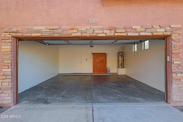 garage featuring electric water heater