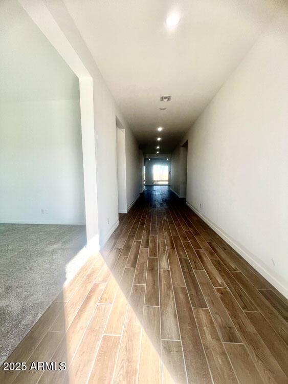 hall with visible vents and wood tiled floor