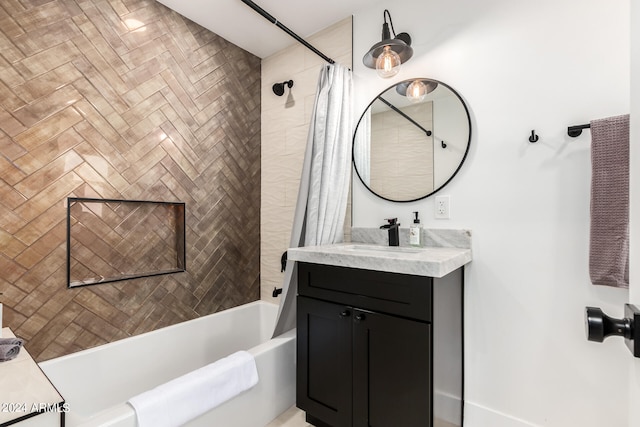 bathroom featuring vanity and shower / bath combo