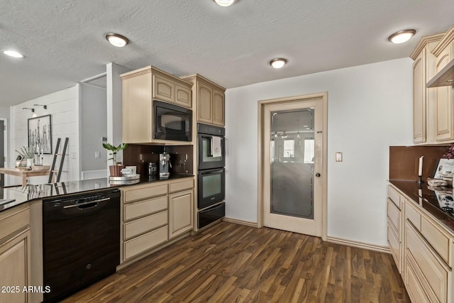 kitchen featuring a textured ceiling, light brown cabinets, black appliances, dark countertops, and dark wood finished floors