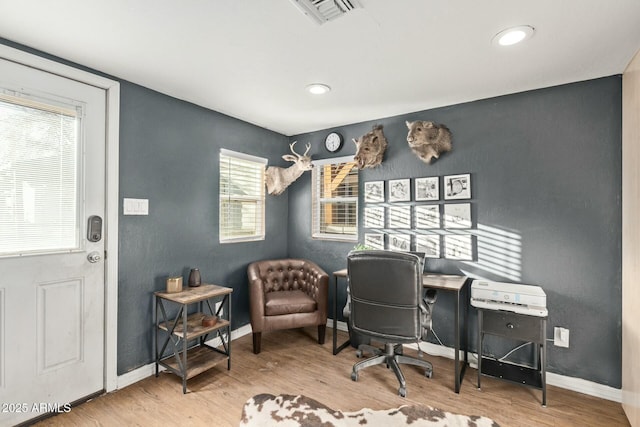 office with baseboards, visible vents, wood finished floors, and recessed lighting