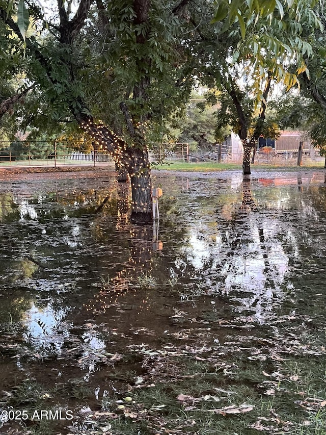 property view of water with fence