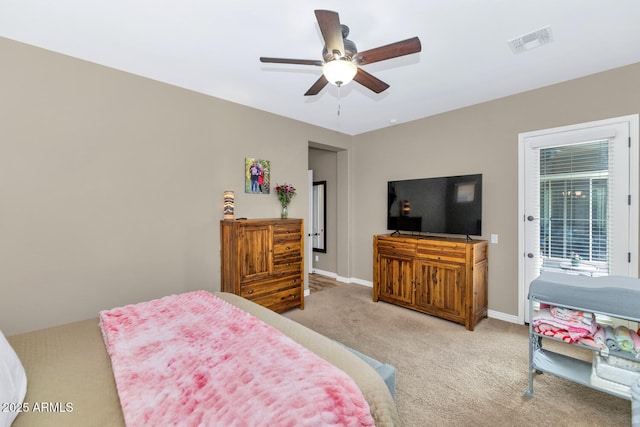 2605 W Desert Marigold Dr, Phoenix, AZ 85085 - bedroom featuring access to outside, a ceiling fan, visible vents, light carpet, and baseboards
