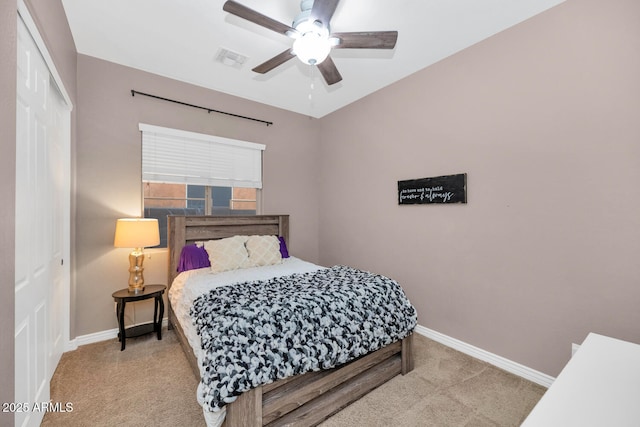2605 W Desert Marigold Dr, Phoenix, AZ 85085 - carpeted bedroom with visible vents, a closet, baseboards, and ceiling fan