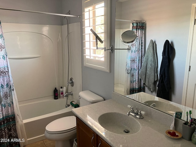 full bathroom featuring tile patterned flooring, toilet, shower / bath combination with curtain, and vanity