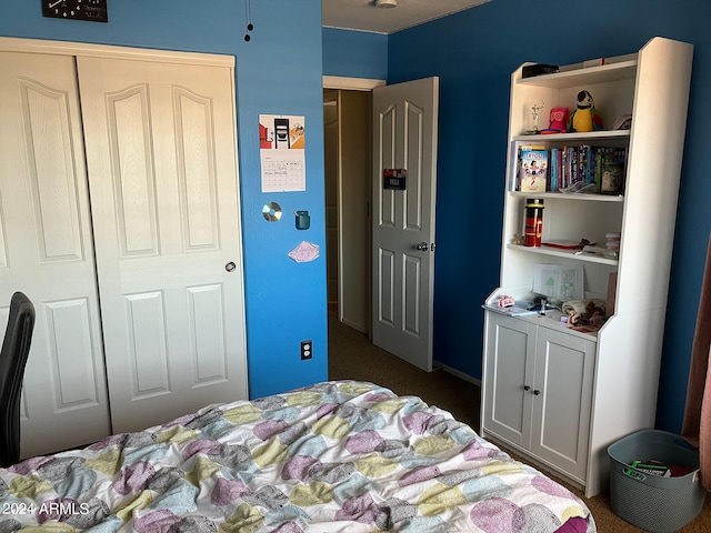 carpeted bedroom featuring a closet