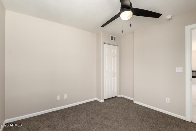619 E Jensen St Unit 14, Mesa, AZ 85203 - empty room with ceiling fan, dark carpet, and a smoke detector