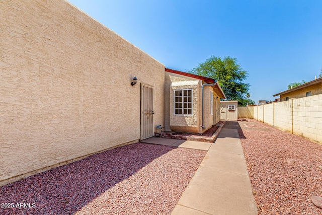 619 E Jensen St Unit 14, Mesa, AZ 85203 - doorway to property with stucco siding