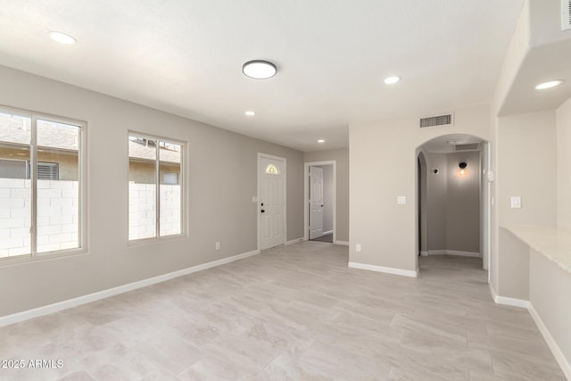 619 E Jensen St Unit 14, Mesa, AZ 85203 - empty room featuring arched walkways and recessed lighting