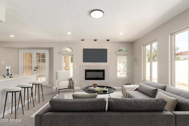 619 E Jensen St Unit 14, Mesa, AZ 85203 - living room with a high end fireplace, french doors, and recessed lighting