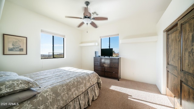3168 S Yaqui Ln, Gold Canyon, AZ 85118 - carpeted bedroom featuring multiple windows and ceiling fan