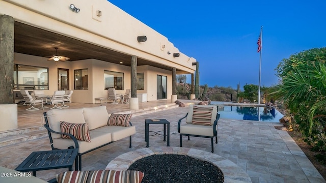 3168 S Yaqui Ln, Gold Canyon, AZ 85118 - view of patio featuring ceiling fan and an outdoor living space with a fire pit