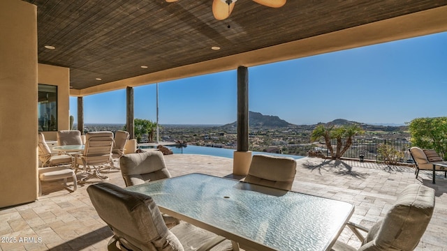 3168 S Yaqui Ln, Gold Canyon, AZ 85118 - view of patio / terrace featuring ceiling fan and a water and mountain view