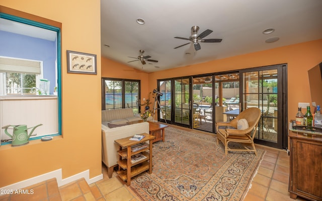 39 E Hoover Ave, Phoenix, AZ 85004 - living room featuring a ceiling fan, recessed lighting, light tile patterned flooring, and lofted ceiling
