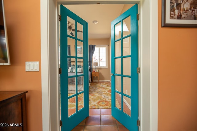39 E Hoover Ave, Phoenix, AZ 85004 - doorway with french doors and tile patterned flooring