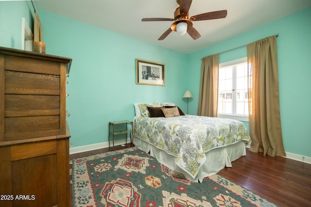 39 E Hoover Ave, Phoenix, AZ 85004 - bedroom with a ceiling fan, baseboards, and wood finished floors