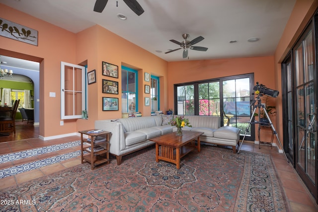 39 E Hoover Ave, Phoenix, AZ 85004 - tiled living area with a ceiling fan, baseboards, recessed lighting, and arched walkways