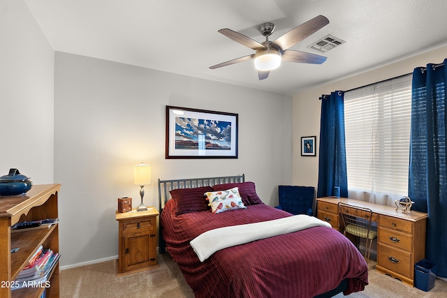 1819 W Deer Creek Rd, Phoenix, AZ 85045 - bedroom with light colored carpet, baseboards, and ceiling fan