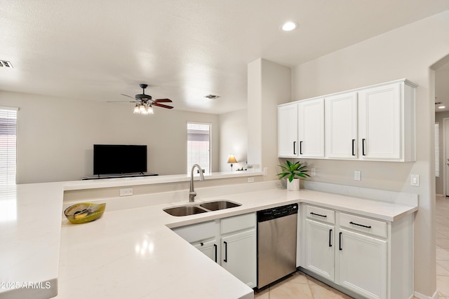 1819 W Deer Creek Rd, Phoenix, AZ 85045 - kitchen featuring stainless steel dishwasher, a sink, a ceiling fan, light tile patterned floors, and light countertops