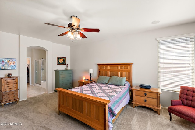 1819 W Deer Creek Rd, Phoenix, AZ 85045 - bedroom featuring arched walkways, carpet, baseboards, and a ceiling fan